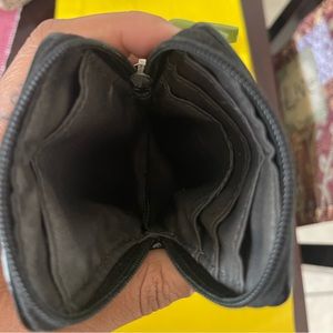 Coach Pepper phone holder.